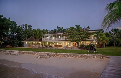 Discovery Bay Villa | Exquisite A Summer Place: Beachfront Villa with Pool & Gym