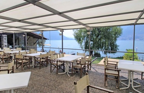 Faggeto Lario Apartment | Superior Comfort at Interhome: Oceanfront Escape Awaits