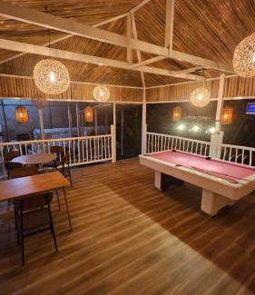 Puerto Princesa Apartment | Discover A Touch of Pink: Oceanfront Garden Retreat