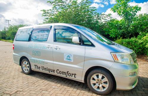 Arusha Hotel | Elegant A1 Hotel and Resort: Pet Friendly with Pool & Hot Tub