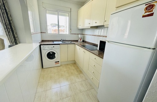 Finestrat Apartment | Beautiful Urban Retreat Steps from the Beach with Spa Access