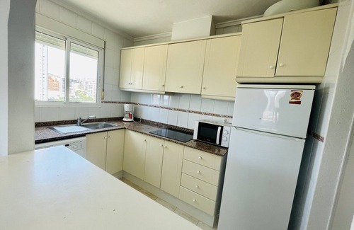 Finestrat Apartment | Beautiful Urban Retreat Steps from the Beach with Spa Access