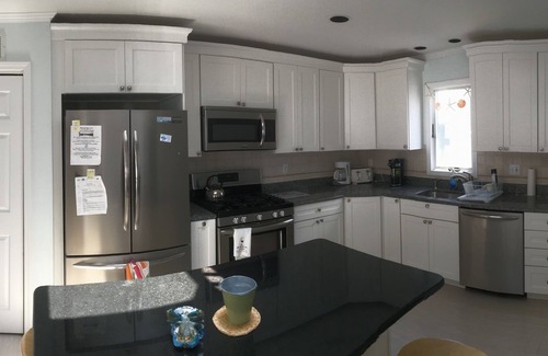 North Beach Haven House | Top-Rated Hotel with Heated Rooftop Pool & Exciting Amenities