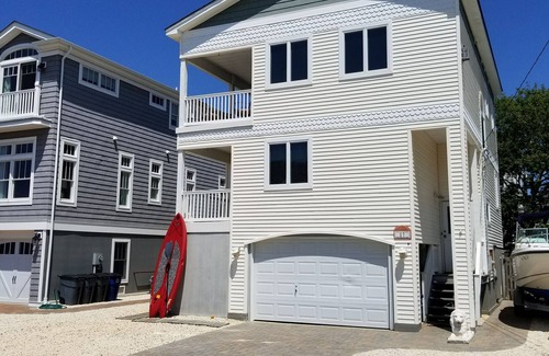 North Beach Haven House | Top-Rated Hotel with Heated Rooftop Pool & Exciting Amenities