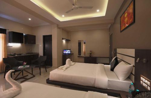 Vijayanagar Hotel | Experience Comfort at Aadya Elite with Breakfast Included