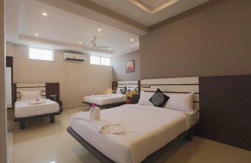 Vijayanagar Hotel | Experience Comfort at Aadya Elite with Breakfast Included