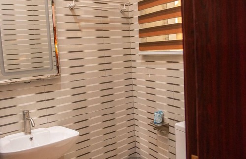Ogbunike Hotel | Stylish Abada Hotel & Suites with Pool and Delicious Dining