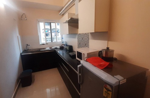 Bullawala Apartment | Discover Abhimaan Stays: Pet-Friendly with Pool Amenities