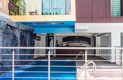 Abidjan Hotel | Relax at Abidjan Luxury Residence with Pool & Breakfast