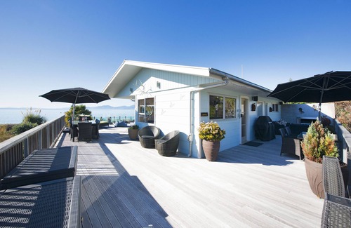Ruby Bay House | Beachfront Haven: Sea Views, Hot Tub & Top Guest Rating