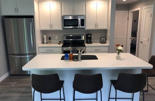 Topsham Apartment | Modern Ocean View Suite with Kitchen & Breakfast Included