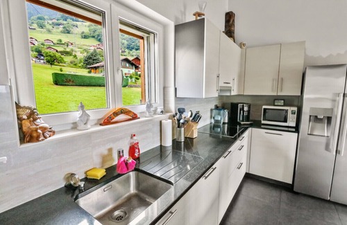 Troistorrents Apartment | Scenic Accommodation Overlooking the Plain with Great Amenities