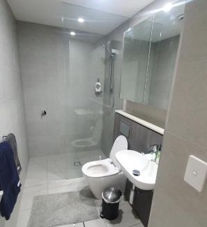 Lidcombe Apartment | Modern 3-Bedroom Retreat Near Accor Stadium with Pool