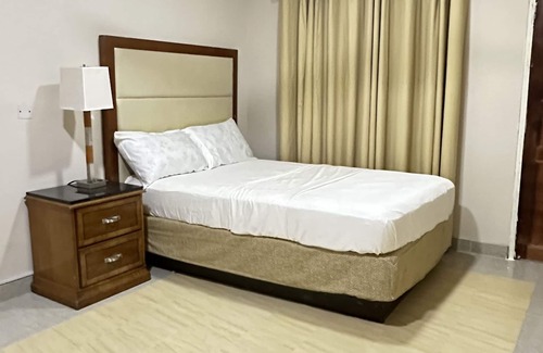 Accra House | Discover Achie Suites: Family-Friendly with Spa & Breakfast