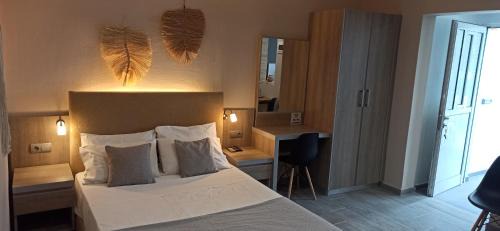 Achlia Apartment | Beachfront Achlia Apartments: Ocean Views & Pet Friendly