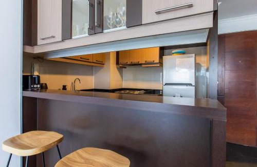 Apoquindo Apartment | Cozy Hotel near Mall with Eco-Friendly Amenities and Parking