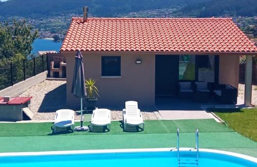 Bueu Apartment | Inviting Oceanfront Guest House with Pool and Breakfast