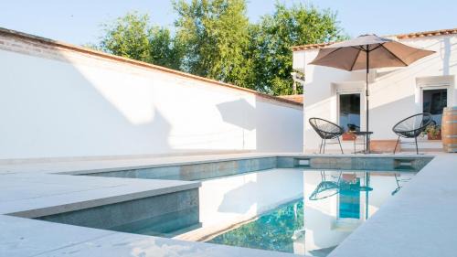 Province of Toledo House | Inviting Guest House with Pool and Ocean Views