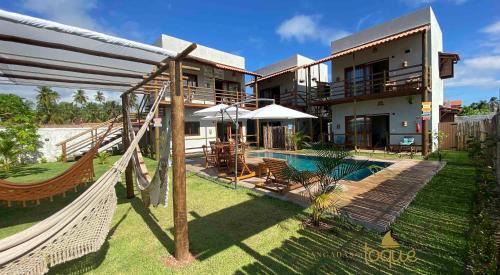 Porto da Rua Apartment | Relax at Jangadas do Toque Milagres Flat with Oceanfront Views
