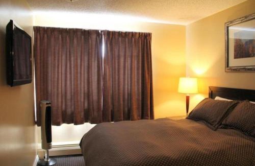 Grande Cache Hotel | Cozy Acorn Motel: Pet-Friendly Haven with Great Reviews