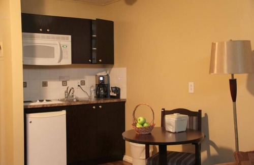 Grande Cache Hotel | Budget-Friendly Acorn Motel with Family Amenities & Breakfast