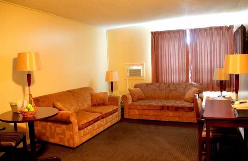 Grande Cache Hotel | Budget-Friendly Acorn Motel with Family Amenities & Breakfast
