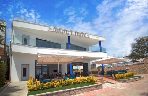 Ortakentyahsi Belediyesi Hotel | Relax at Acropol Of Bodrum Beach Hotel with Private Beach