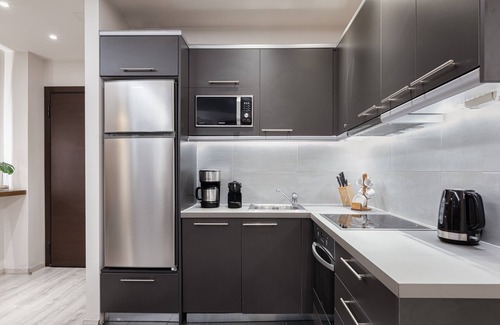 Koukaki Apartment | Elegant Acropolis Apartment: Steps to Metro & Top Ratings