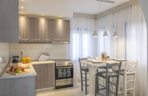 Elia Apartment | Elegant Acrotel Athena Villa: Ocean View & Spa Retreat