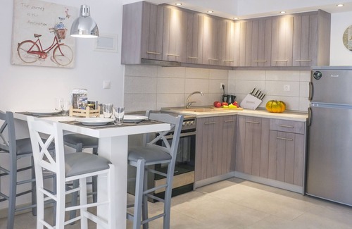 Elia Apartment | Elegant Acrotel Athena Villa: Ocean View & Spa Retreat