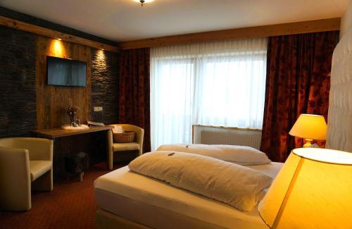 See Hotel | Inviting Stay at Ad Laca: Family-Friendly with a Hot Tub