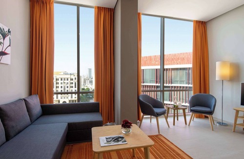 Al Muntazah Hotel | Discover Adagio Doha: Poolside Retreat with Family Amenities