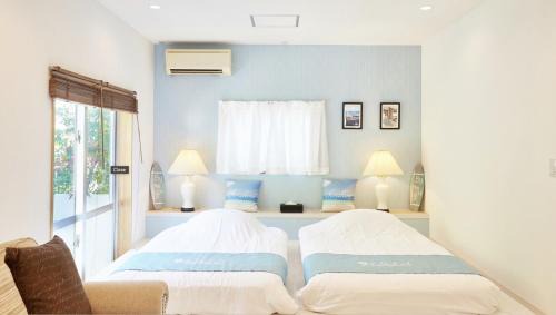 Bise Villa | Adan Resort Fu: Oceanfront Retreat with Hot Tub Access