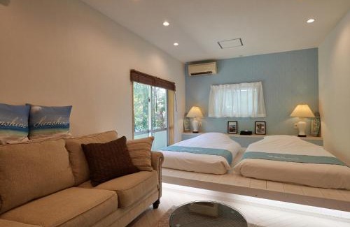 Bise Villa | Adan Resort Fu: Oceanfront Retreat with Hot Tub Access
