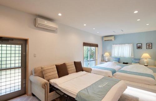 Bise Villa | Adan Resort Fu: Oceanfront Retreat with Hot Tub Access
