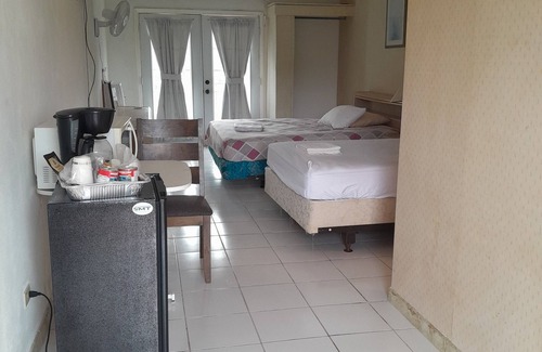 Andros Town Apartment | Seaside Comfort at Adderley's Motel with Oceanfront Views