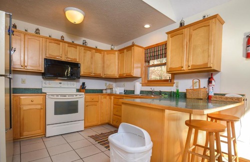 McHenry House | Adlerskron Four-Bedroom Holiday Home with Hot Tub & Kitchen