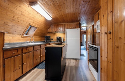 Grant Cabin | adorable A-frame house nestled right by the river
