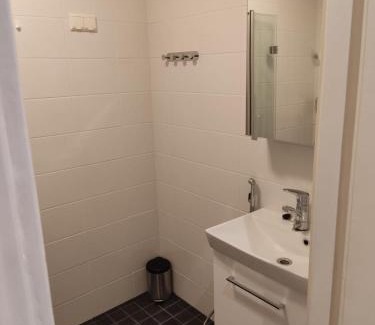 Keskinen District Apartment | Charming Central Apartment in Helsinki with Family Amenities