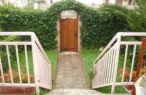 Laredo House | Relaxing Retreat with Pool & Gardens, Steps from the Beach