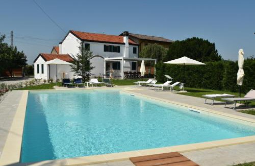 Adria House | Cozy Adria bnb: Oceanfront Stay with Pool and Spa Access