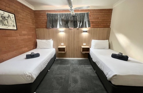 Forbes Hotel | Budget-Friendly Stay at Adrian Motel with Pool & Kitchen