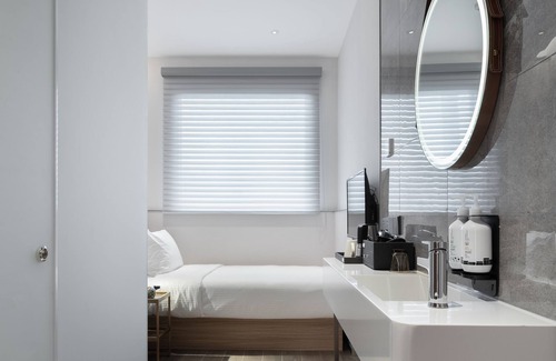 Daxing Hotel | Discover Aerotel: Poolside Retreat with Family-Friendly Perks