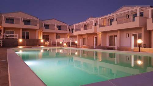 Viddalba Apartment | Pet-Friendly Retreat at Affittimoderni Viddalba Bouganville