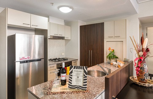 Brisbane Central Business District Apartment | Unforgettable African Escape on Level 38 with Ocean View