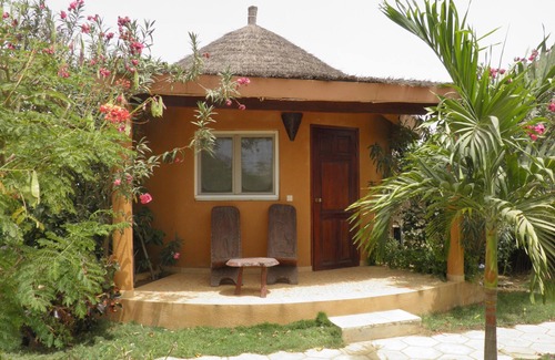 Mbour House | Inviting African Hut Retreat with Pool & Ocean Views