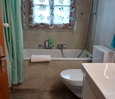 Emmetten House | Experience Afrika Zimmer with Majestic Mountain Views