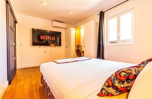 Quartier Administrations House | AfroBoHome, Expérience Atypique, clim, 2 à 6 personnes, Proche centre Nîmes, Garage clos