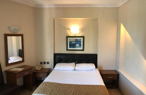 Zeytinli Hotel | Discover AFYTOS ÖREN PARK MTK: Poolside Oceanfront Escape