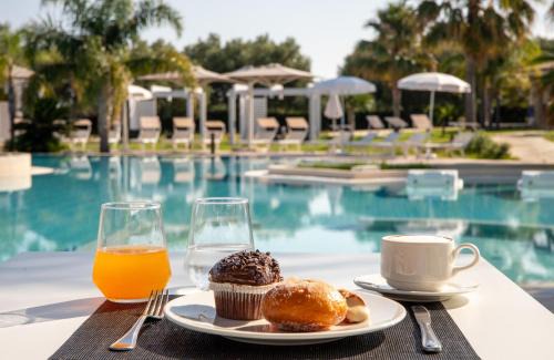 Ricadi Bed & Breakfast | Experience Agave Blu: Oceanfront Paradise with Pool Access